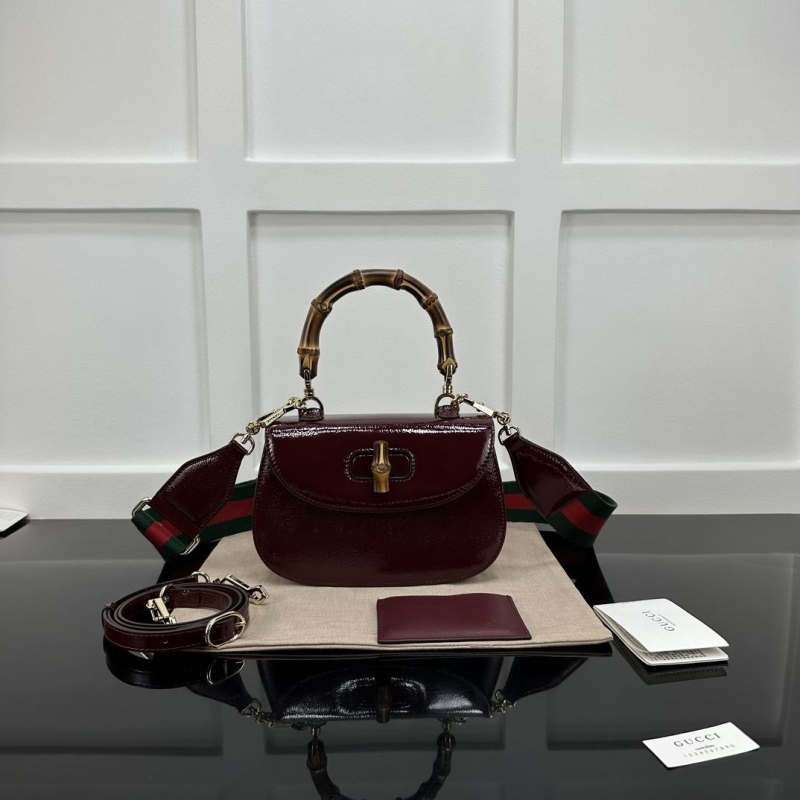 G*u*i top handle bags